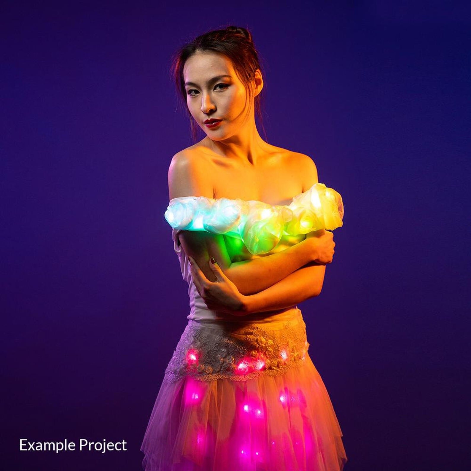 Flexible LED strand bent to demonstrate wearable flexibility